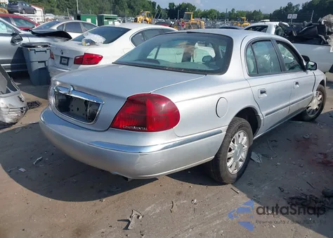 2002 Lincoln Continental из США, поврежденный, VIN 1LNHM97V32Y655654